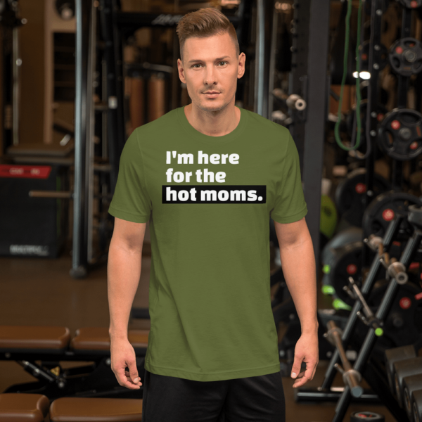 man in I'm here for the hot moms tshirt olive green with black text